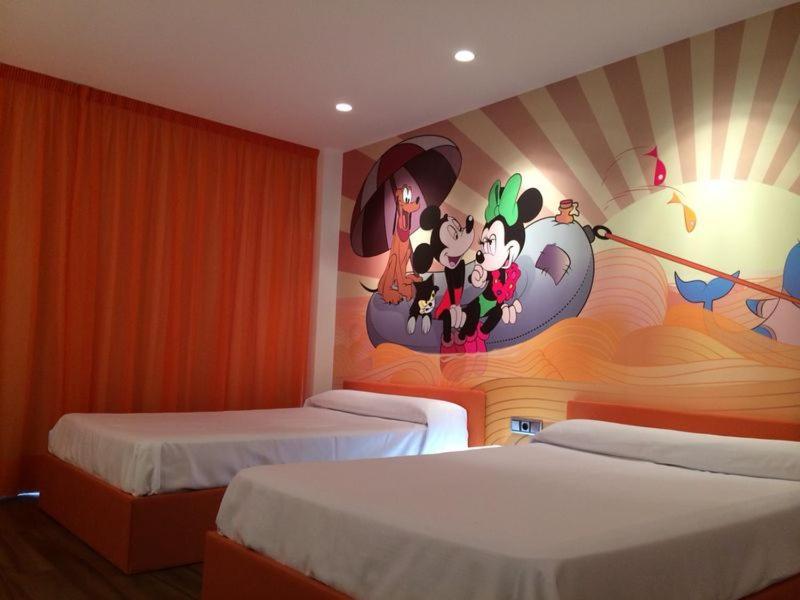 Cama o camas de una habitación en Hotel Acuazul