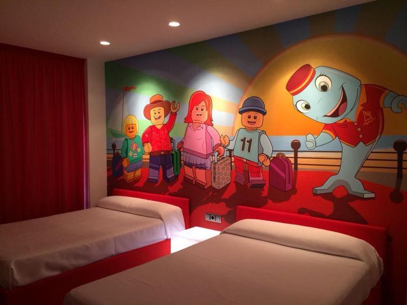 Cama o camas de una habitación en Hotel Acuazul
