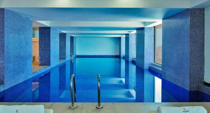 A lovely studio apartment with gym and pool access - Housity