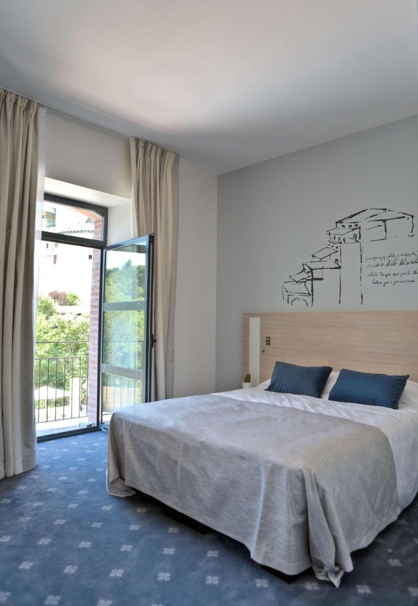Un ou plusieurs lits dans un hébergement de l'établissement Best Western Plus Villa Saint Antoine Hotel & Spa