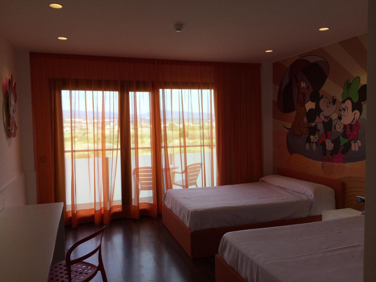 Cama o camas de una habitación en Hotel Acuazul