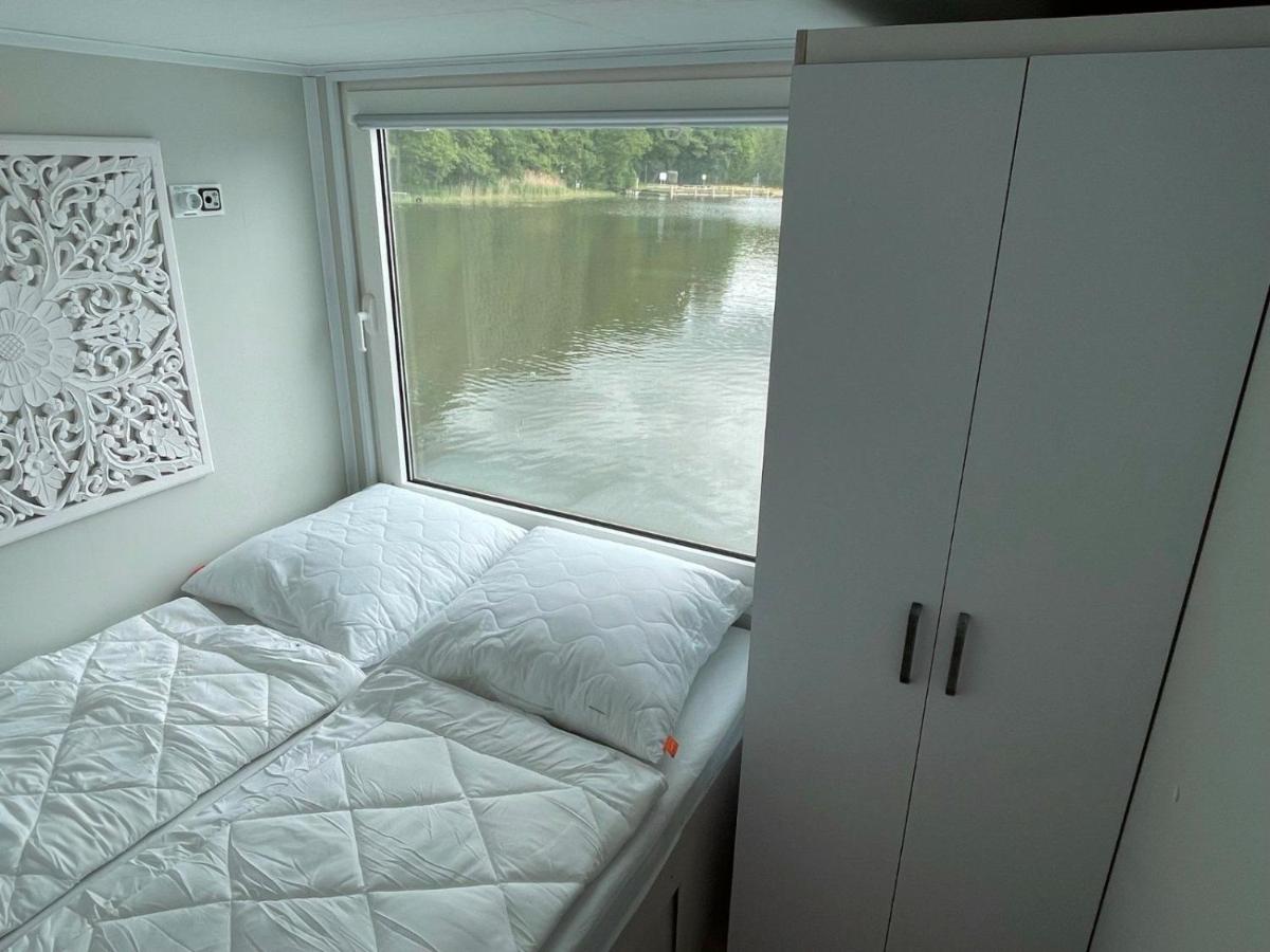Suitetrails - Hausboot Müritz, festliegend mit Sauna