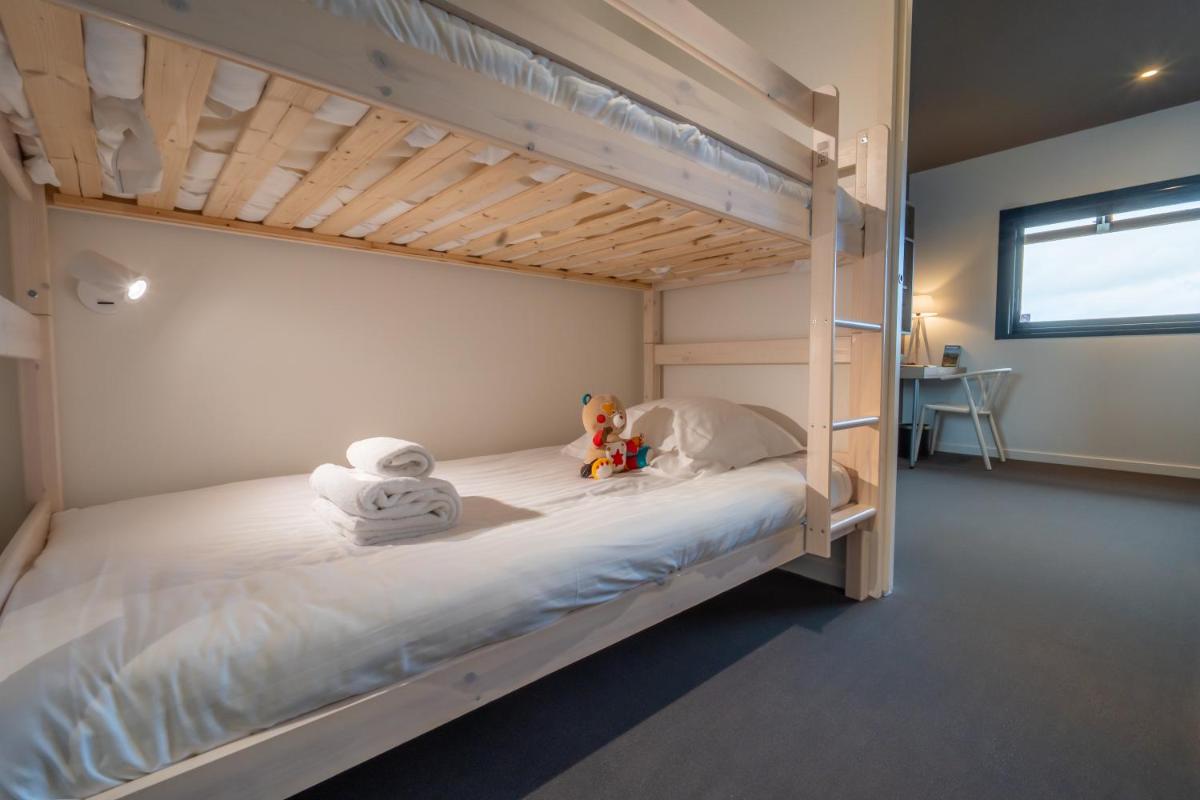 Un ou plusieurs lits dans un hébergement de l'établissement Mildiss Hotel Spa & Restaurant, BW Signature Collection