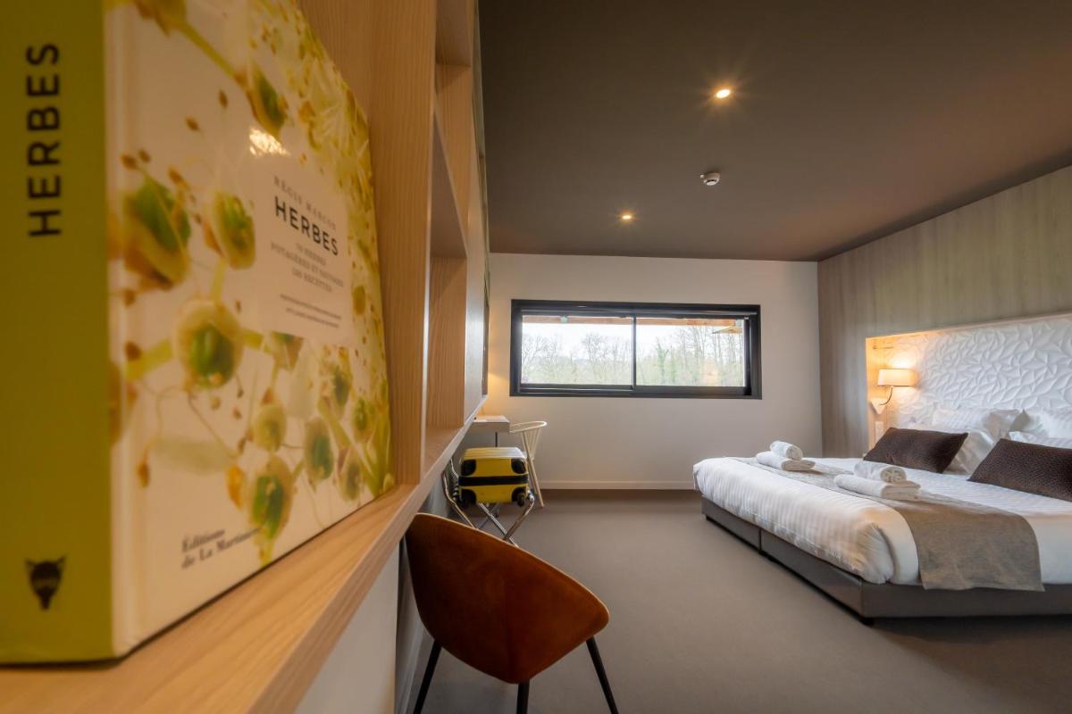 Un ou plusieurs lits dans un hébergement de l'établissement Mildiss Hotel Spa & Restaurant, BW Signature Collection