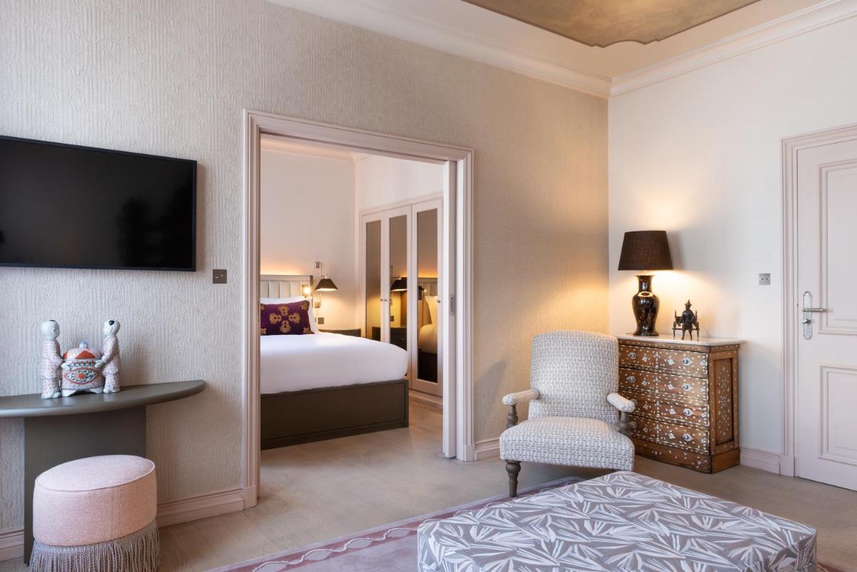 Un ou plusieurs lits dans un hébergement de l'établissement Hotel de Montesquieu