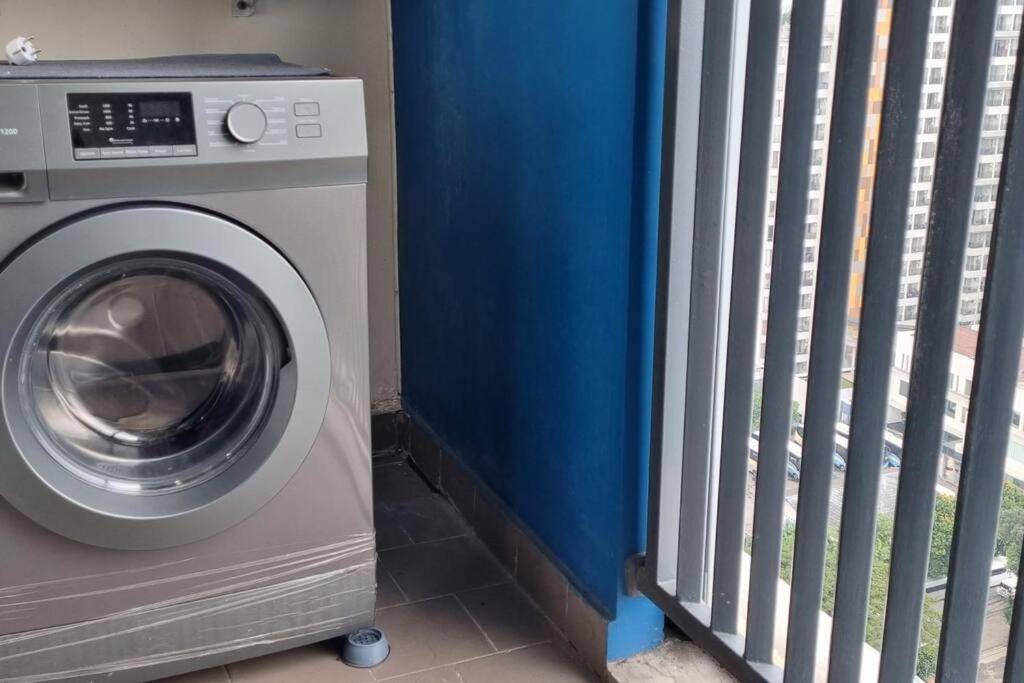 Apt Pejaten Park Residence 2 BR Grey dgn Netflix, Bathub, Pool - Housity