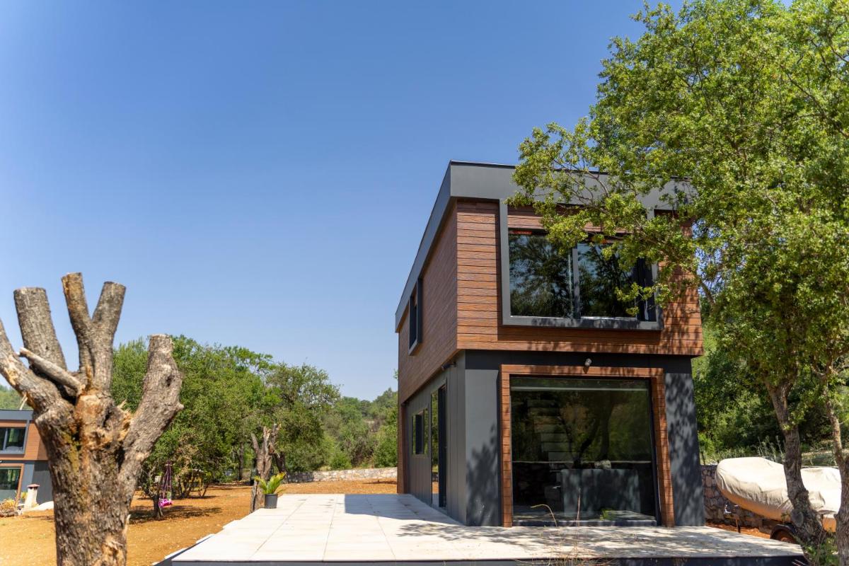 Green Göcek Tiny Houses - Housity