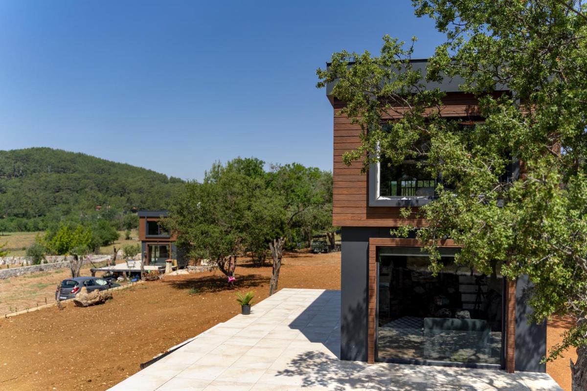 Green Göcek Tiny Houses - Housity