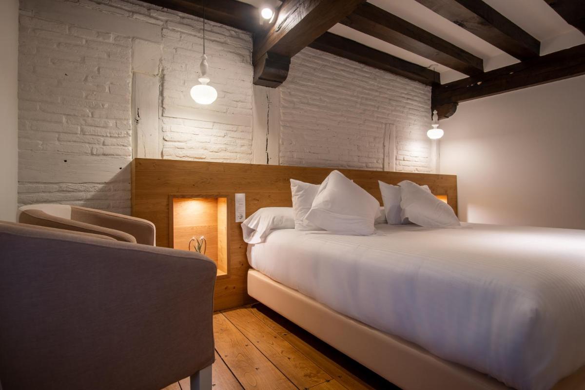 Cama o camas de una habitación en Hotel Casa del Marqués