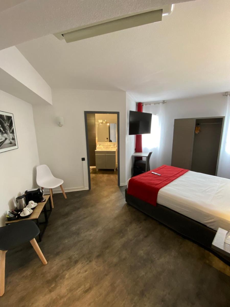Un ou plusieurs lits dans un hébergement de l'établissement The Originals City, Hôtel Les Dômes, Perpignan Sud Saleilles
