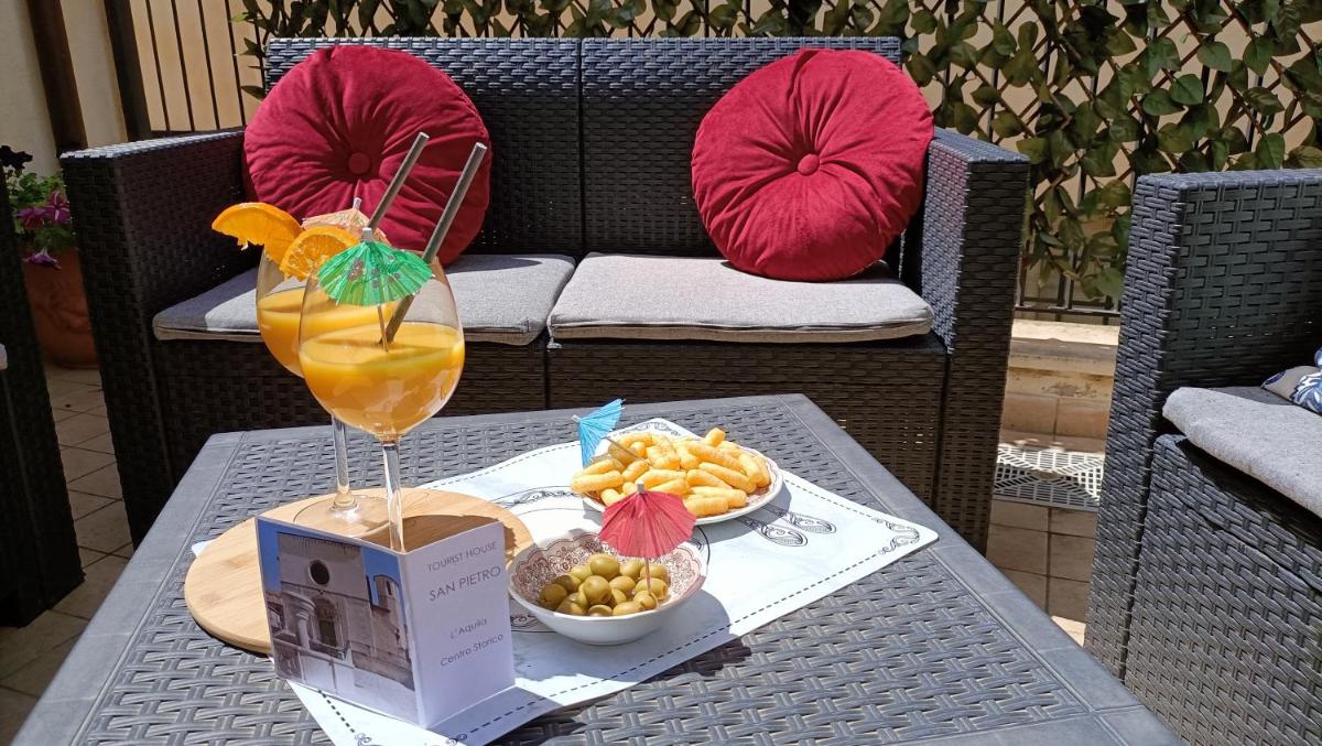 Cozy House con Corte Privata in Centro Storico AQ - Hizvo