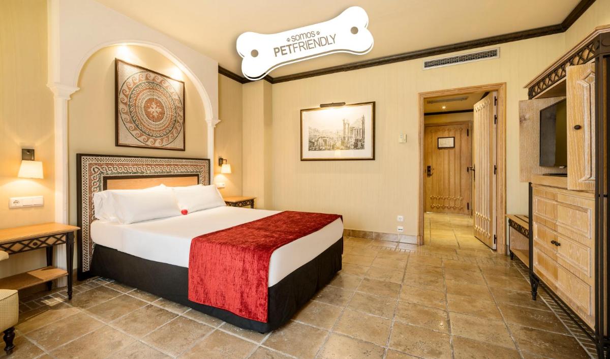 Cama o camas de una habitación en Hotel Ilunion Mérida Palace
