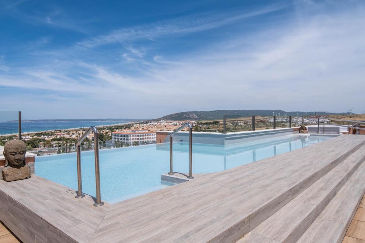 Piscina en o cerca de El Cortijo de Zahara by QHotels