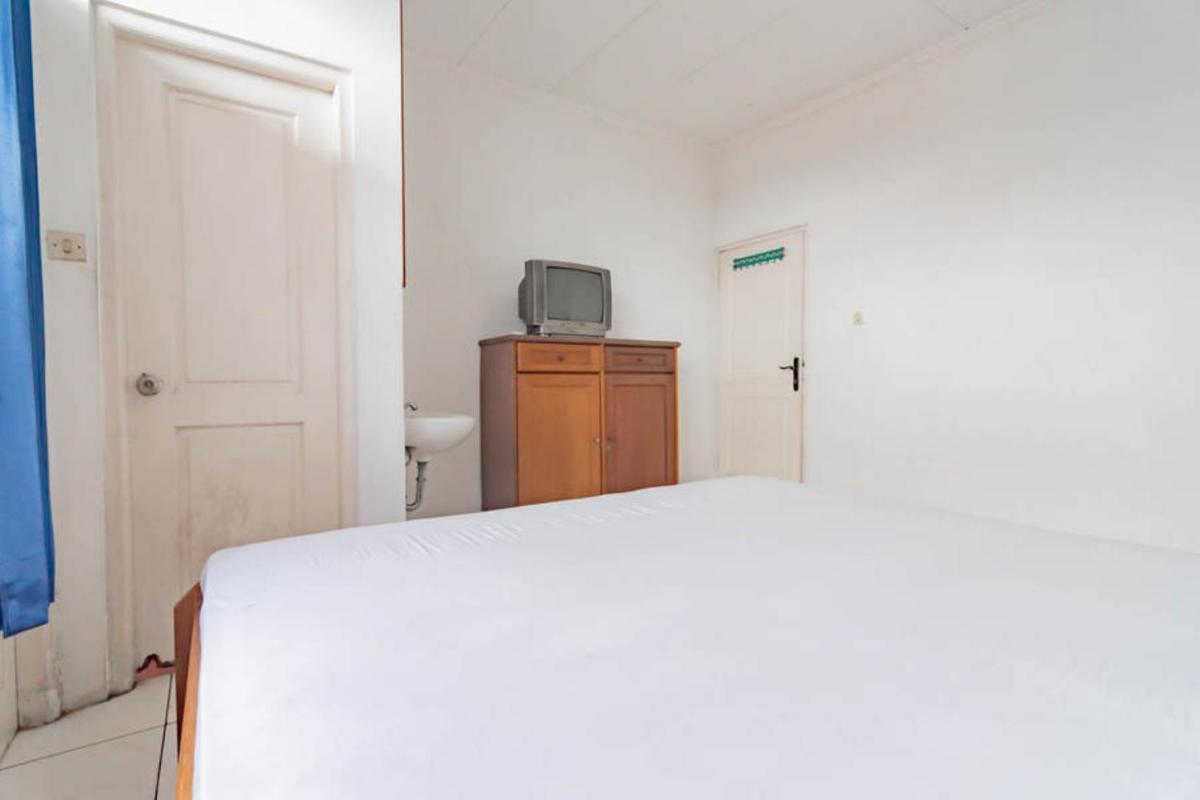Pall Inn Puncak Mitra RedDoorz - Housity