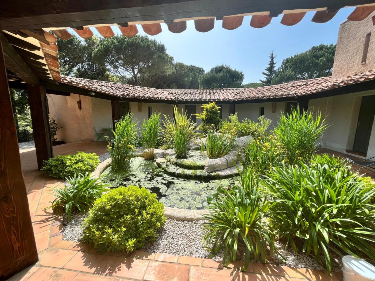 Jardin de l'établissement Auberge Val Moureze Hôtel & Spa