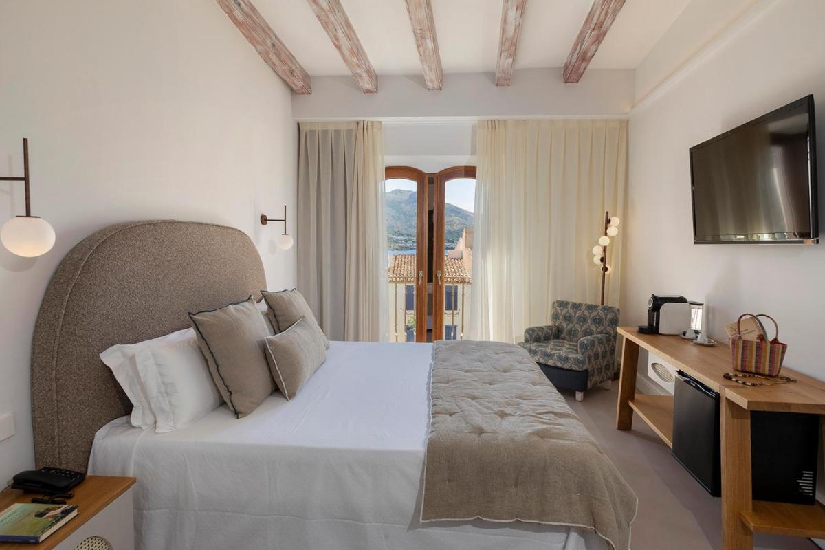 Cama o camas de una habitación en Hotel Spa Porto Cristo