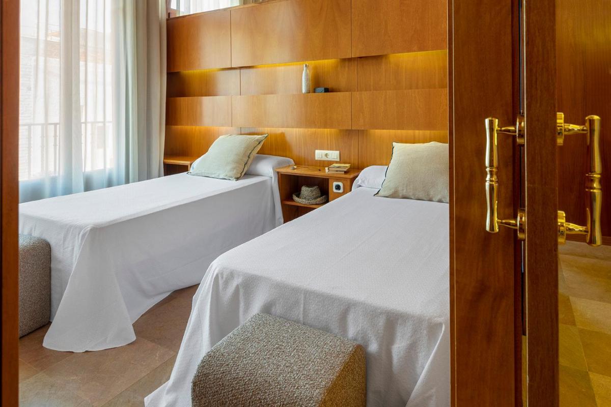 Cama o camas de una habitación en Hotel Spa Porto Cristo