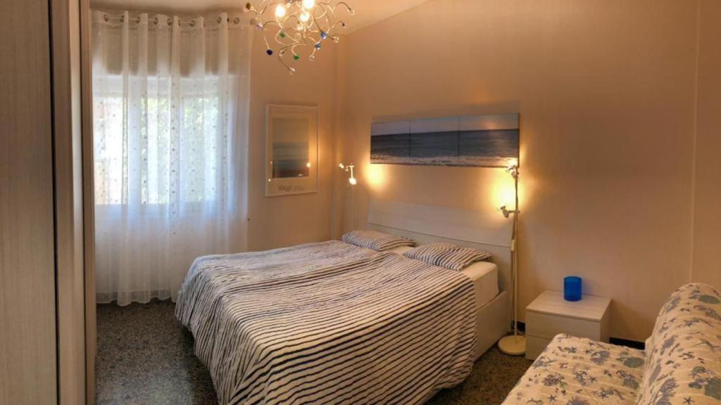 Suitetrails - Grande BILOCALE con GIARDINO e POSTO AUTO PRIVATO Comodo al mare