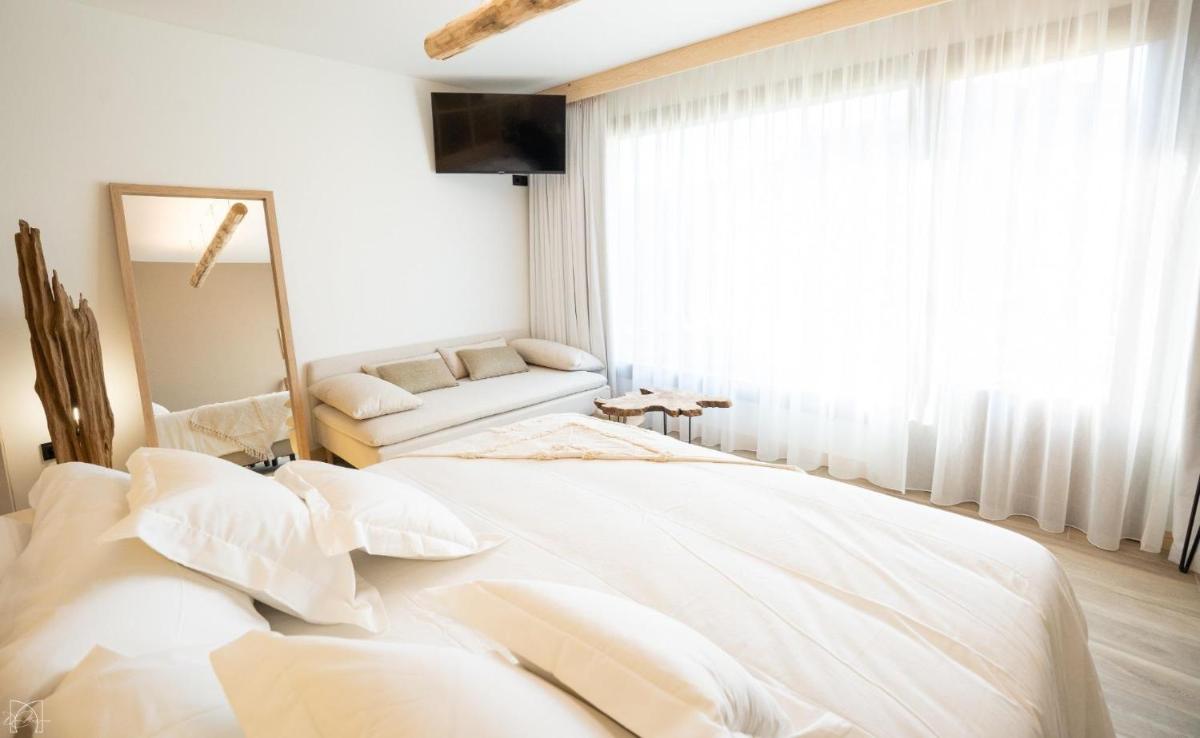 Cama o camas de una habitación en Hotel Don Marcos