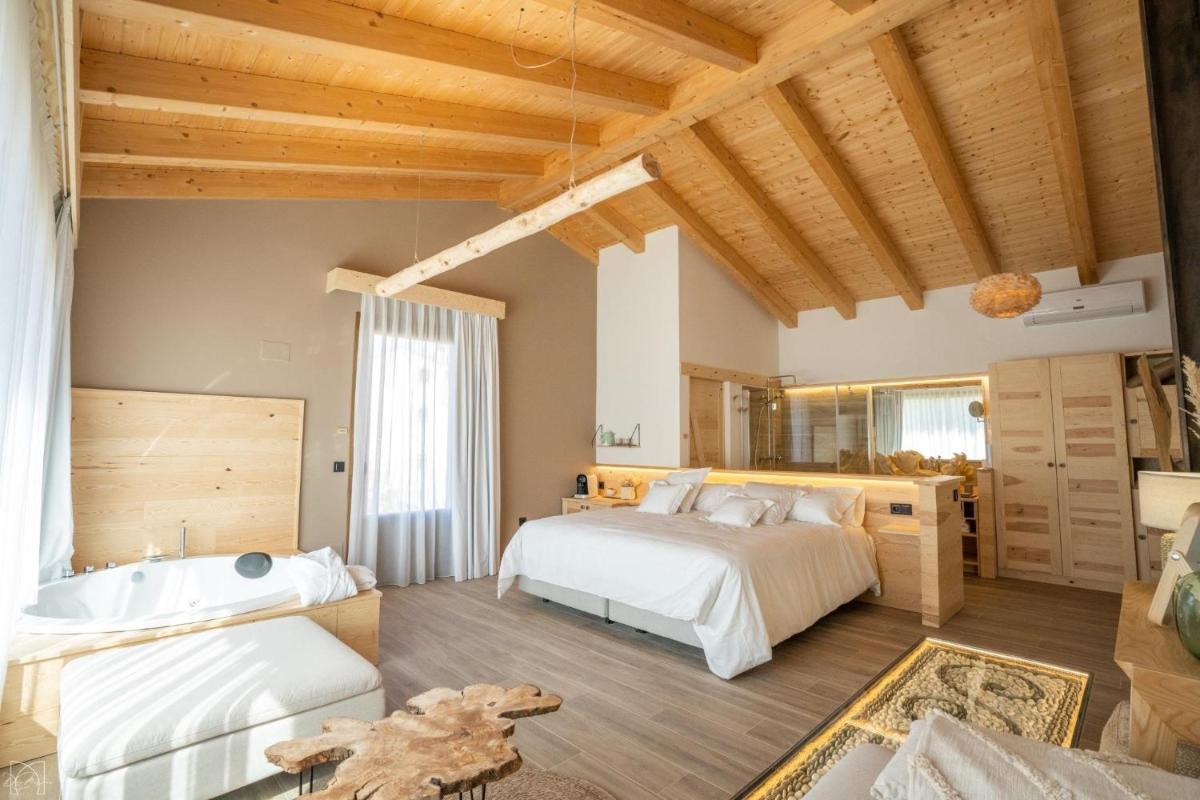 Cama o camas de una habitación en Hotel Don Marcos