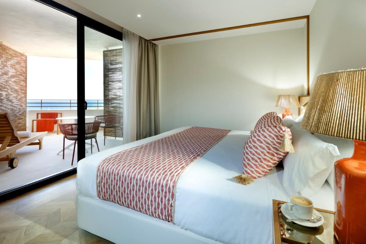 Cama o camas de una habitación en TRS Ibiza Hotel - Adults Only