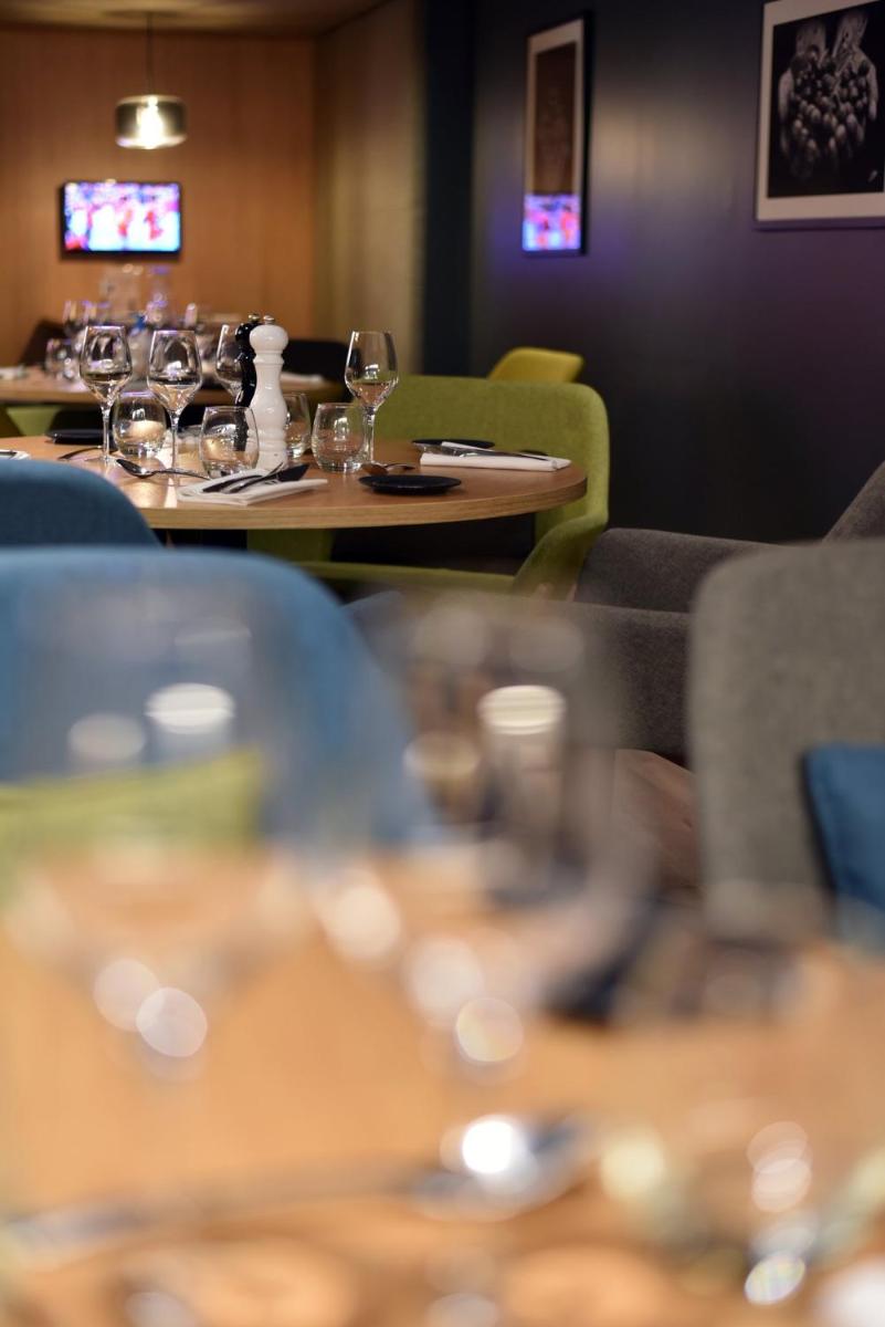 Coin salon dans l'établissement Holiday Inn Dijon Toison D'or by IHG