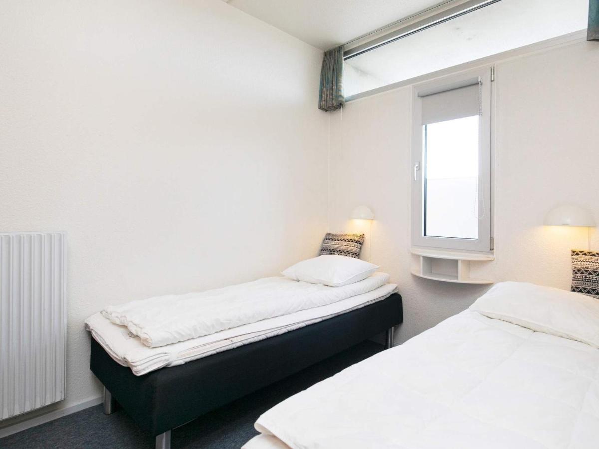 4 person holiday home on a holiday park in Blokhus - Housity