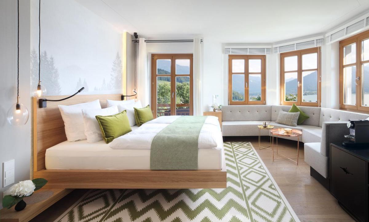 Ein Bett oder Betten in einem Zimmer der Unterkunft Das Tegernsee