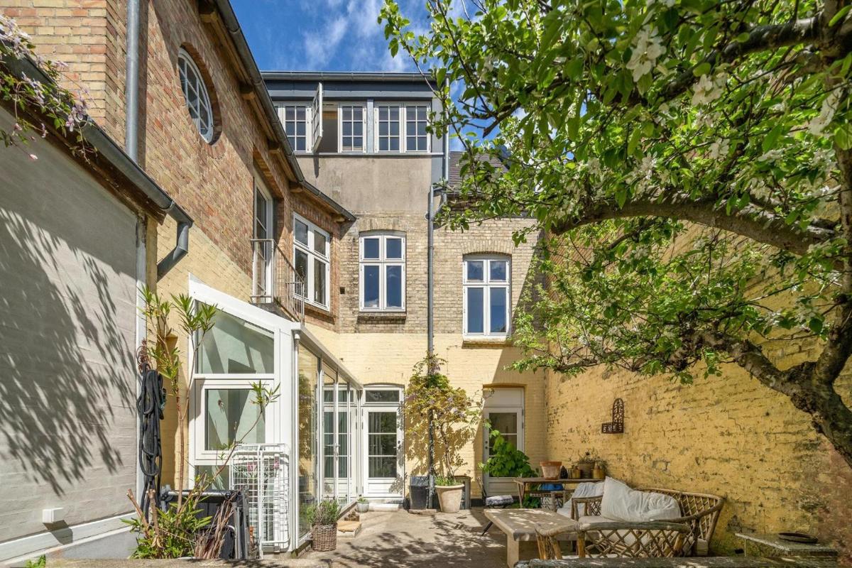 Suitetrails - Light and modern apartment with green courtyard