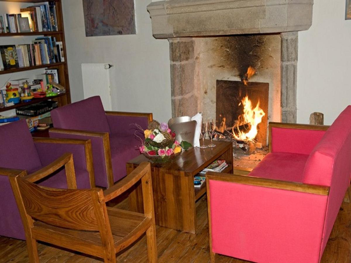 Coin salon dans l'établissement Hotel La Bougnate