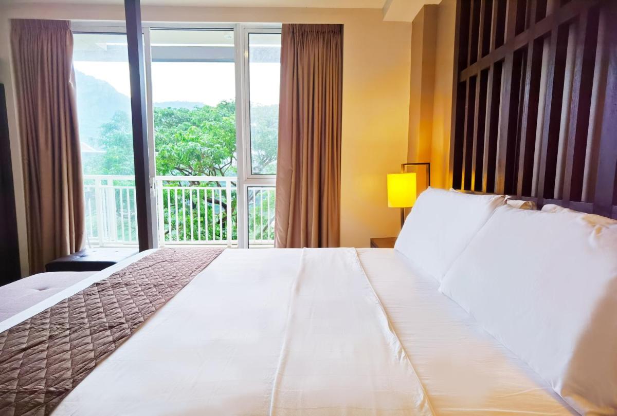 Carola B416 at Pico de Loro Beach and Country Club by SEE Condominiums - Housity
