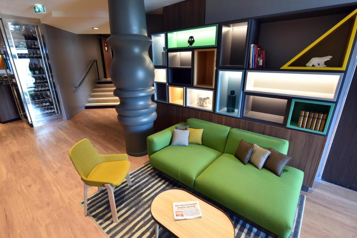 Coin salon dans l'établissement Holiday Inn Dijon Toison D'or by IHG
