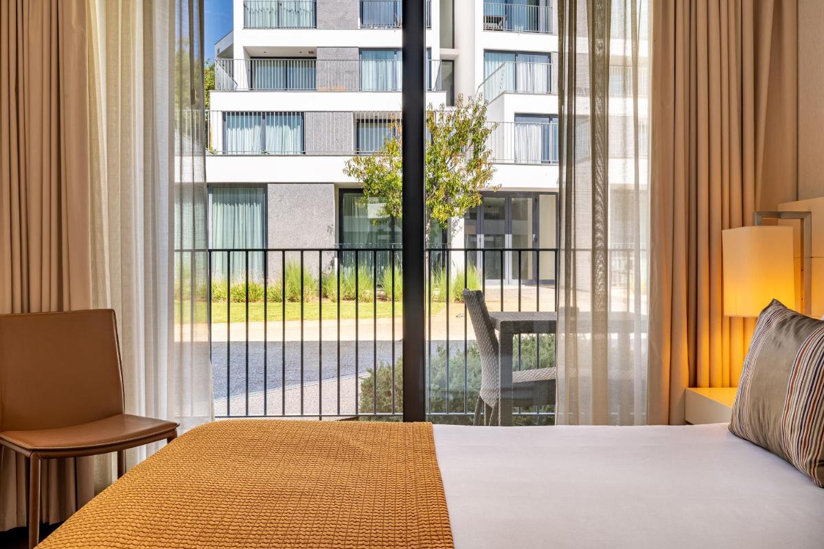 Uma cama ou camas num quarto em Monchique Resort & Spa
