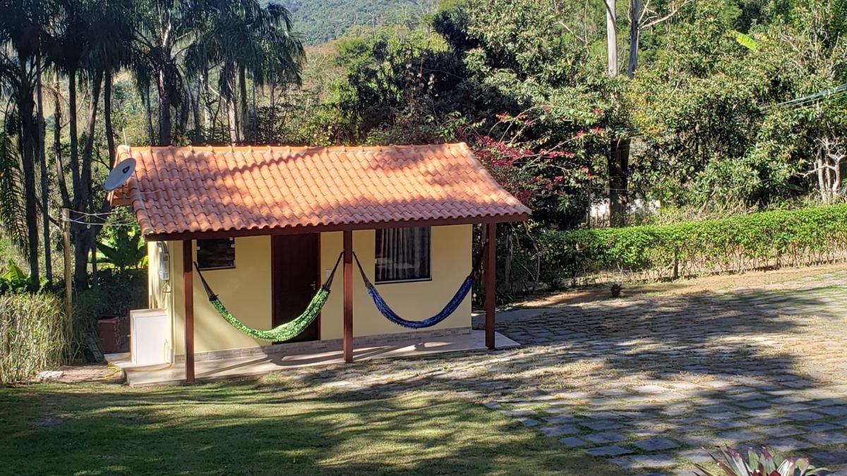 Pousada Beija Flor-Lumiar - Piscinas e Café - Housity