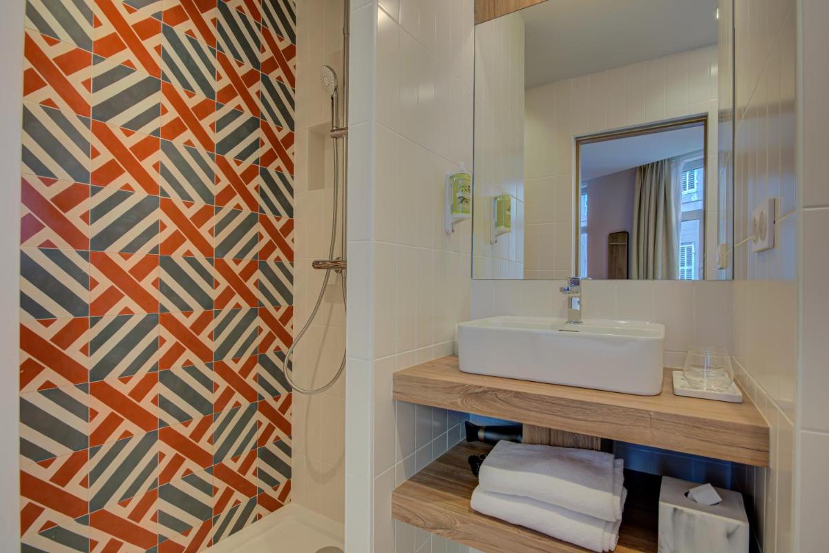 Salle de bains dans l'établissement Alex Hotel & Spa