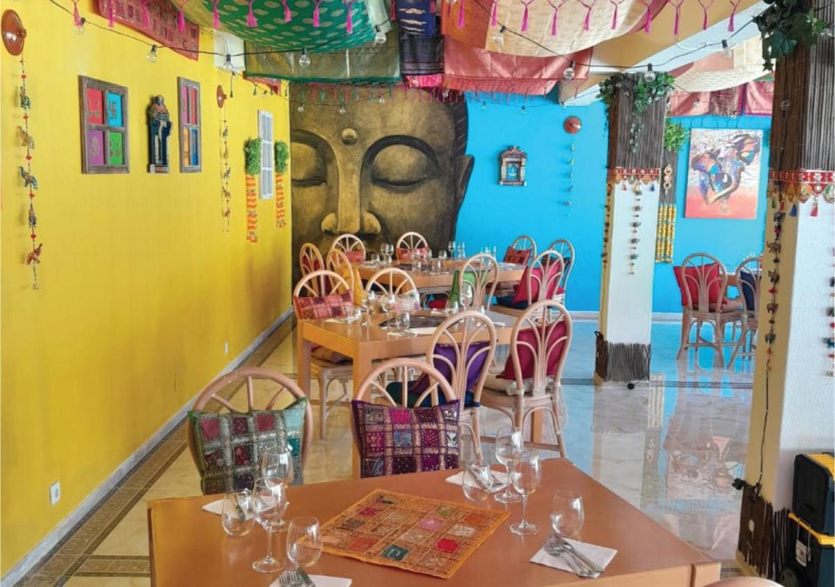 Um restaurante ou outro lugar para comer em Muthu Clube Praia da Oura
