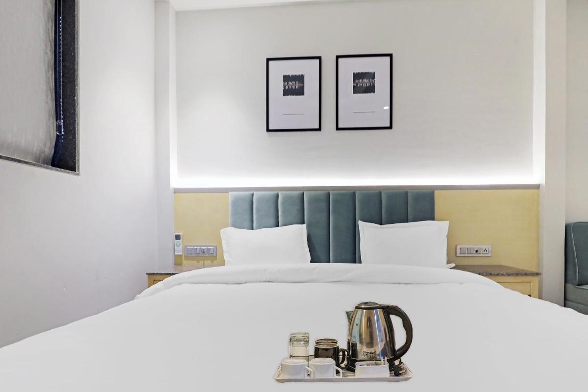 FabHotel Oasis Yellow Courtyard - Housity