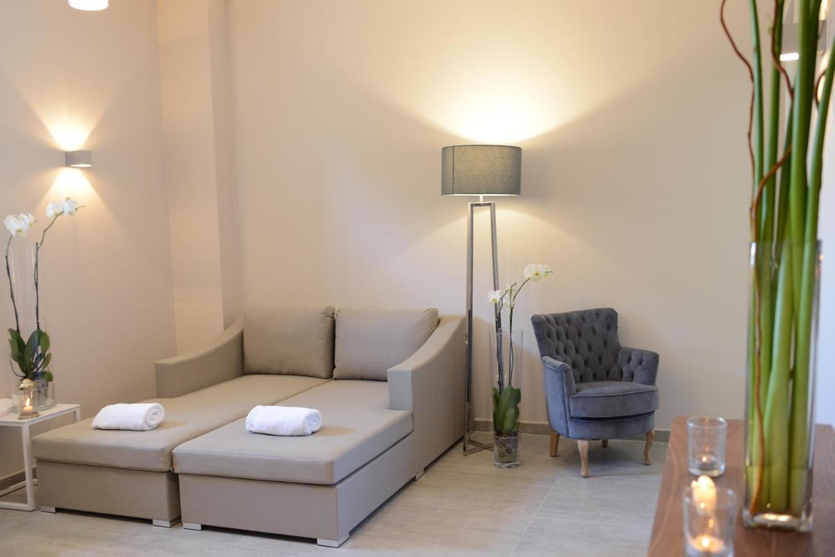 Coin salon dans l'établissement Hotel du Soleil et Spa