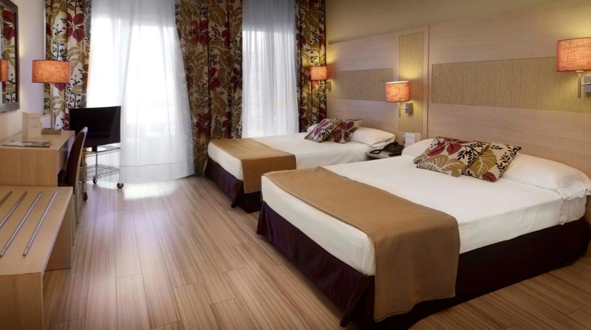 Cama o camas de una habitación en Augusta Club & Spa - Adults Only