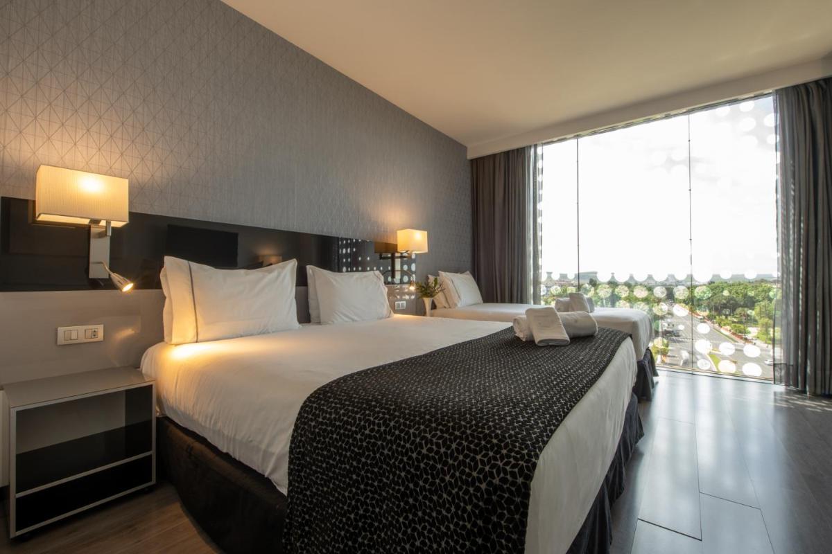 Cama o camas de una habitación en Eurostars Palace