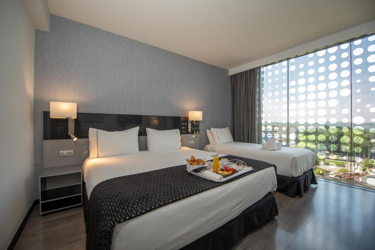 Cama o camas de una habitación en Eurostars Palace