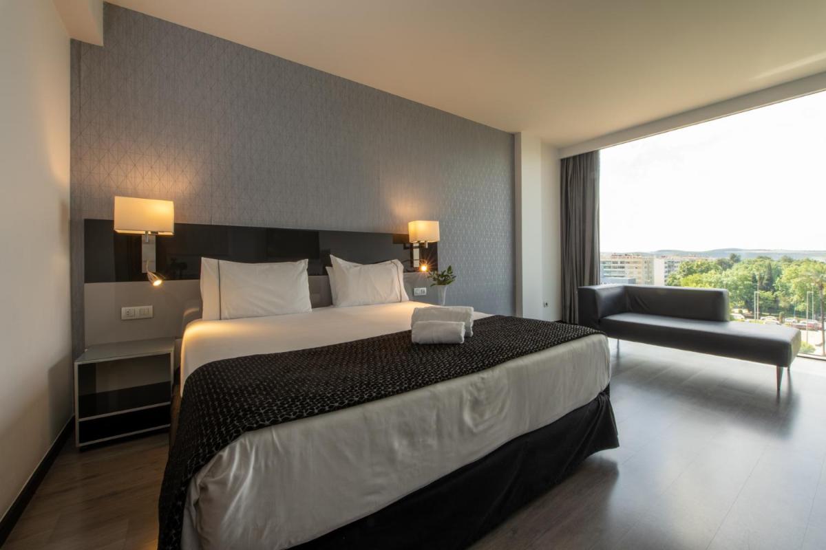 Cama o camas de una habitación en Eurostars Palace