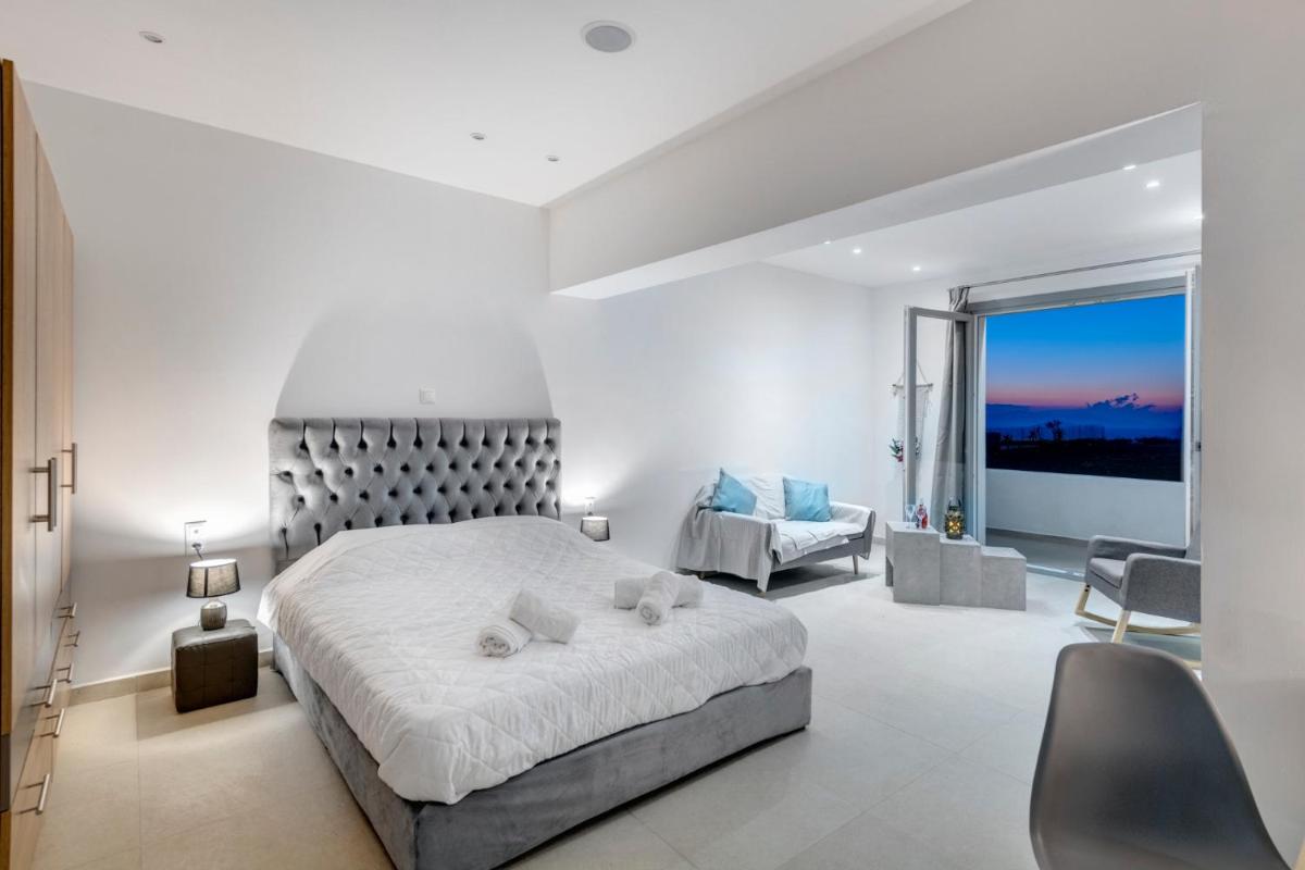 Chrysonisos Suites with Sunset & Seaviews near Kini - Housity