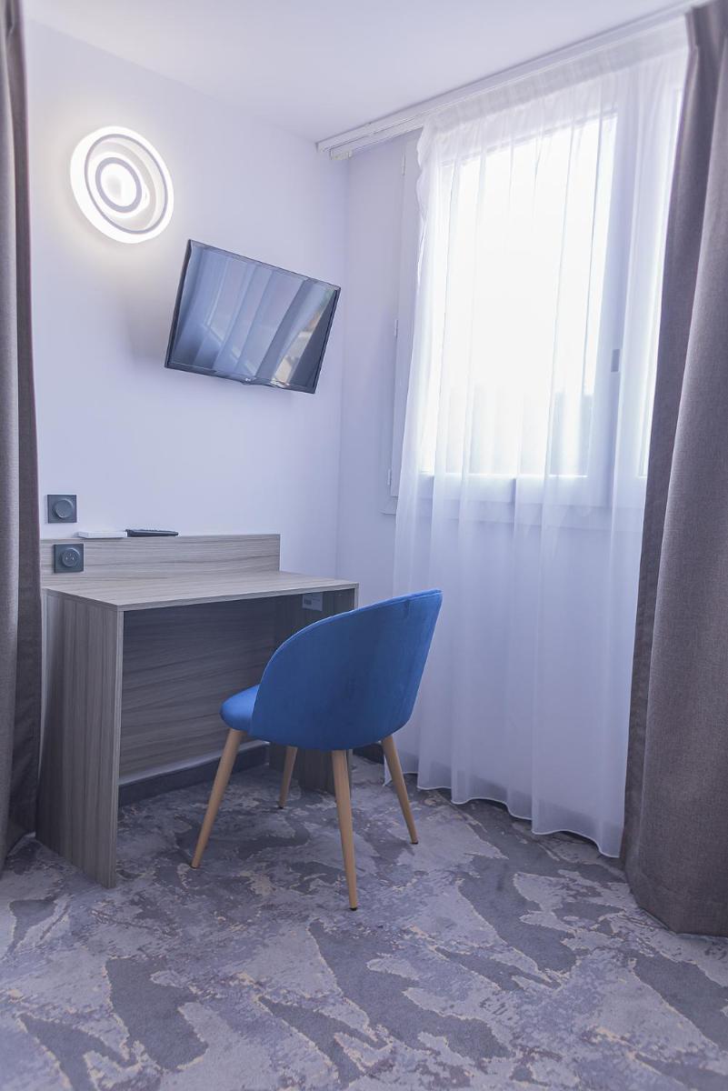 Télévision ou salle de divertissement dans l'établissement Relax'Otel & Spa, Le Barcarès