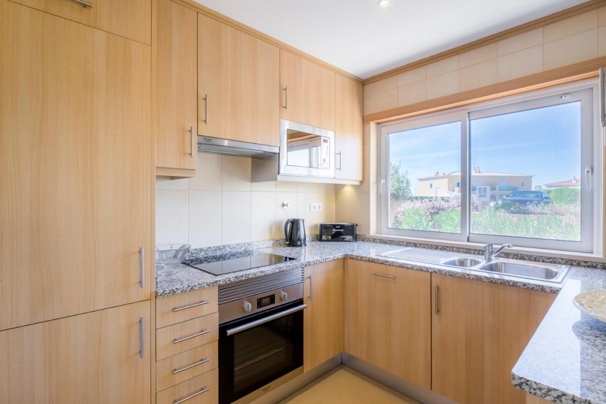 A cozinha ou kitchenette de Boavista Golf & Spa - Bela Colina Holidays