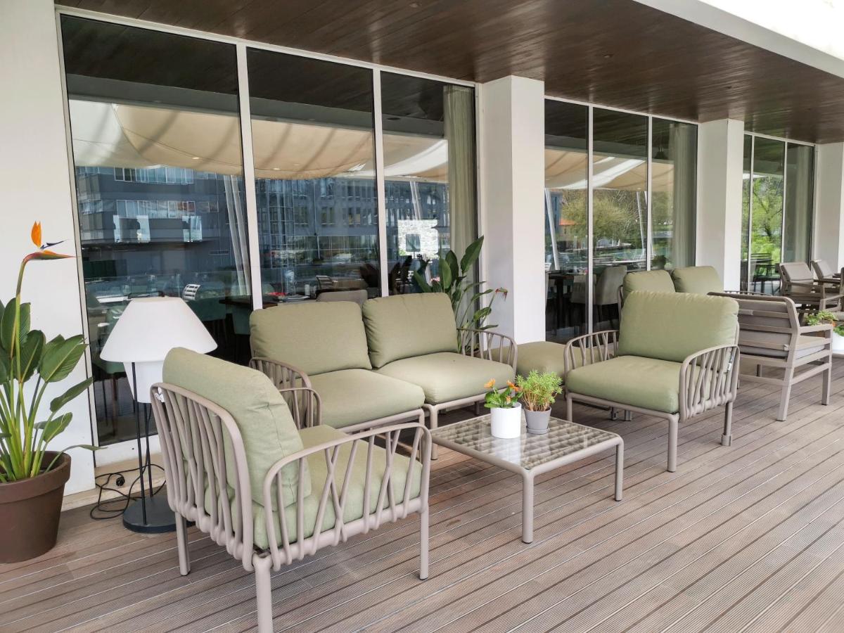 Uma área de estar em Hotel Vouga