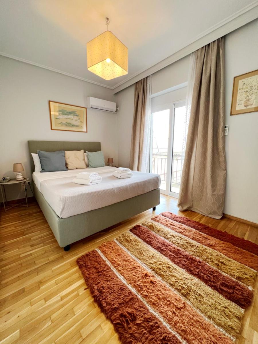 Suitetrails - Peaceful Apartment by Flisvos Marina by Athenian Homes
