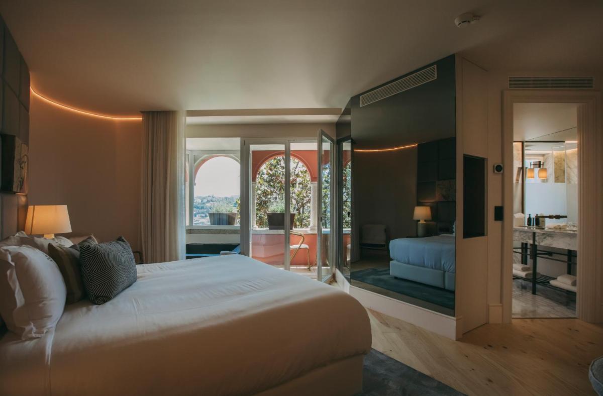 Uma cama ou camas num quarto em Torel Avantgarde