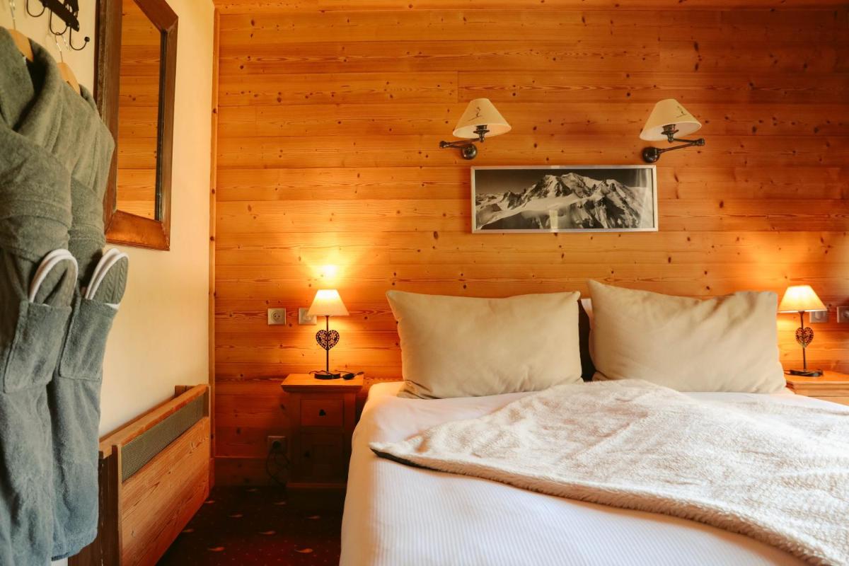 Un ou plusieurs lits dans un hébergement de l'établissement Les Grands Montets Hotel & Spa
