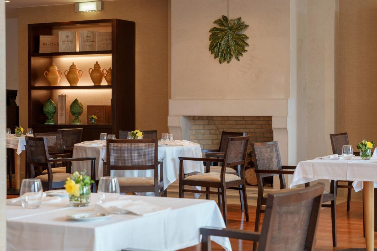 Uma área de estar em Hotel Dom Goncalo & Spa